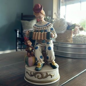 Clown and monkey musical figure